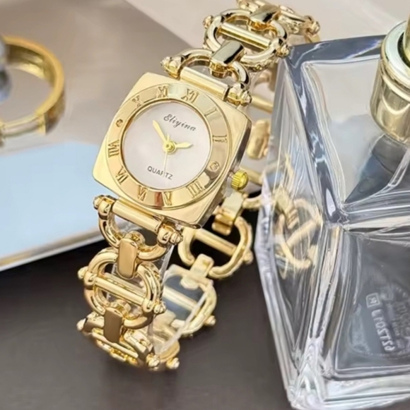 Anthropologie Accessories - Feminine Stainless Steel Gold Women's Watch by